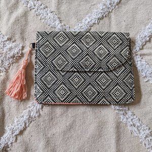 Woven envelope clutch bag